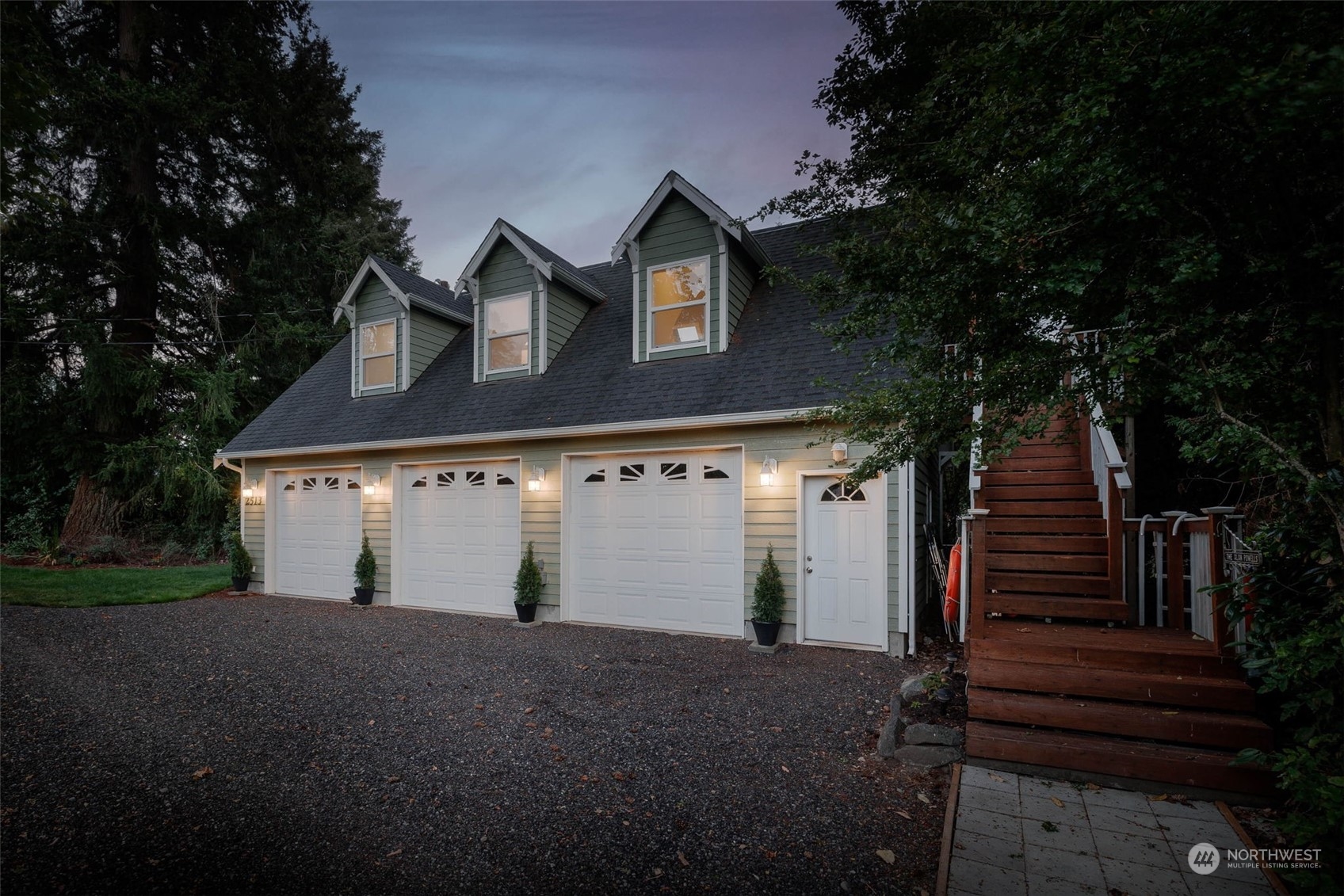 2513 Mayes Road Southeast Olympia, WA 98503 - Photo 29 of 30 a view of a white house next to a yard and garage