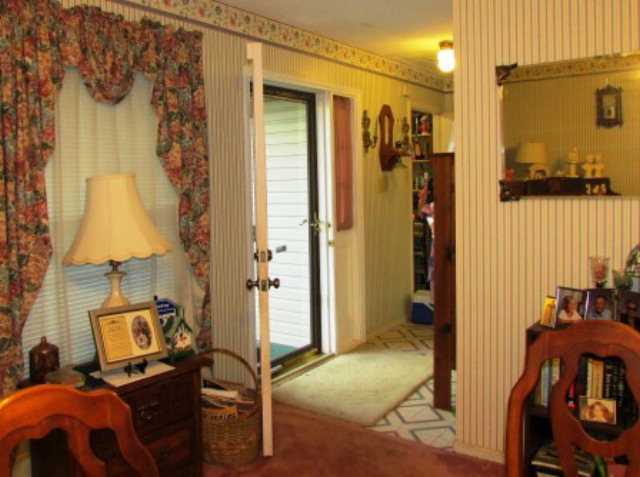 400 Homer Roberts Road Gray, GA 31032 - Photo 3 of 23 a view of a bedroom with bathroom and front door