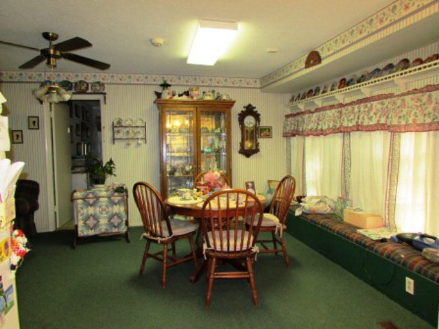 400 Homer Roberts Road Gray, GA 31032 - Photo 8 of 23 a dining room with furniture and window