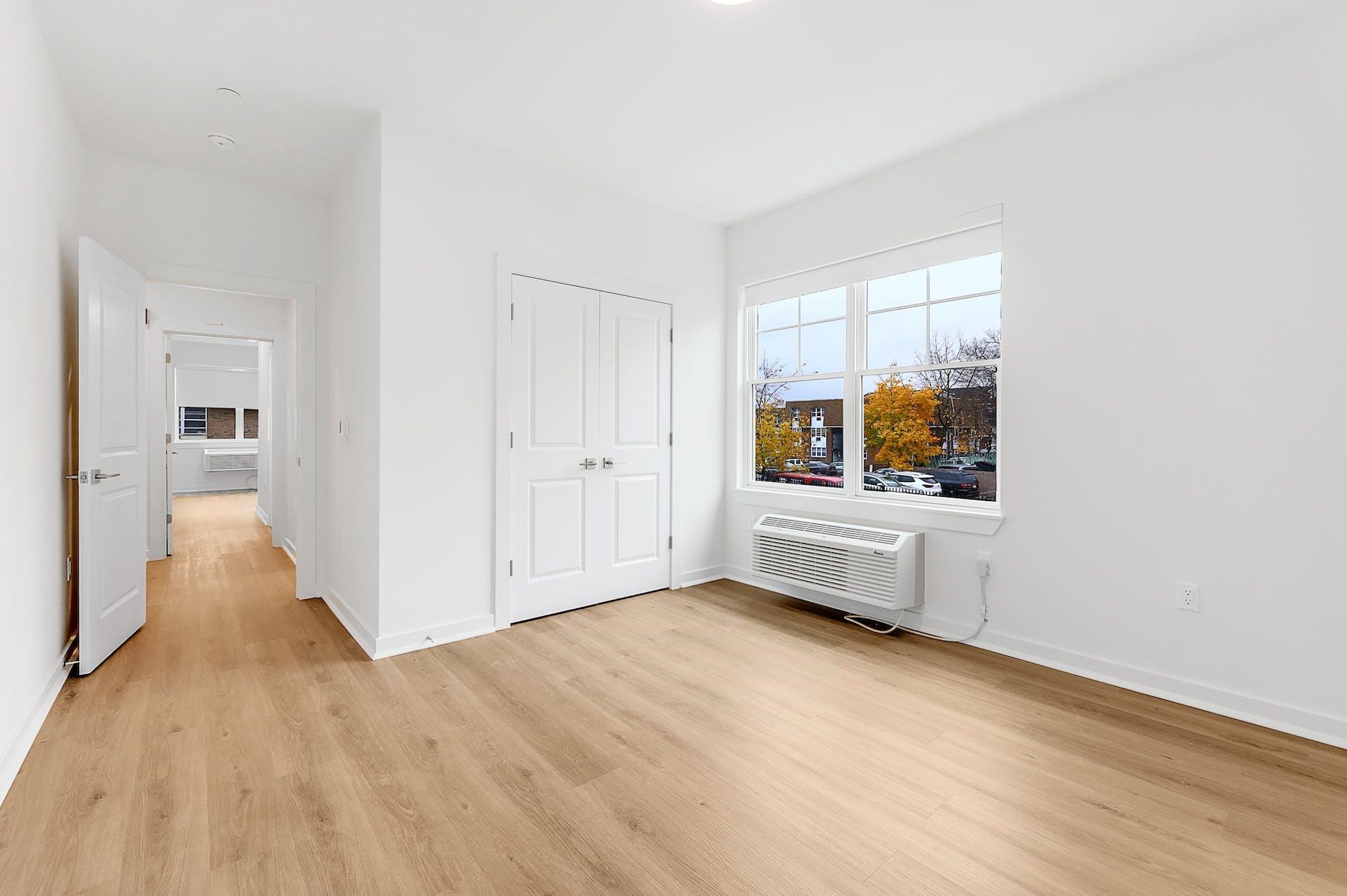74 Clarendon Place, Unit 202 Hackensack, NJ 07601 - Photo 11 of 33 a view of livingroom with furniture and wooden floor