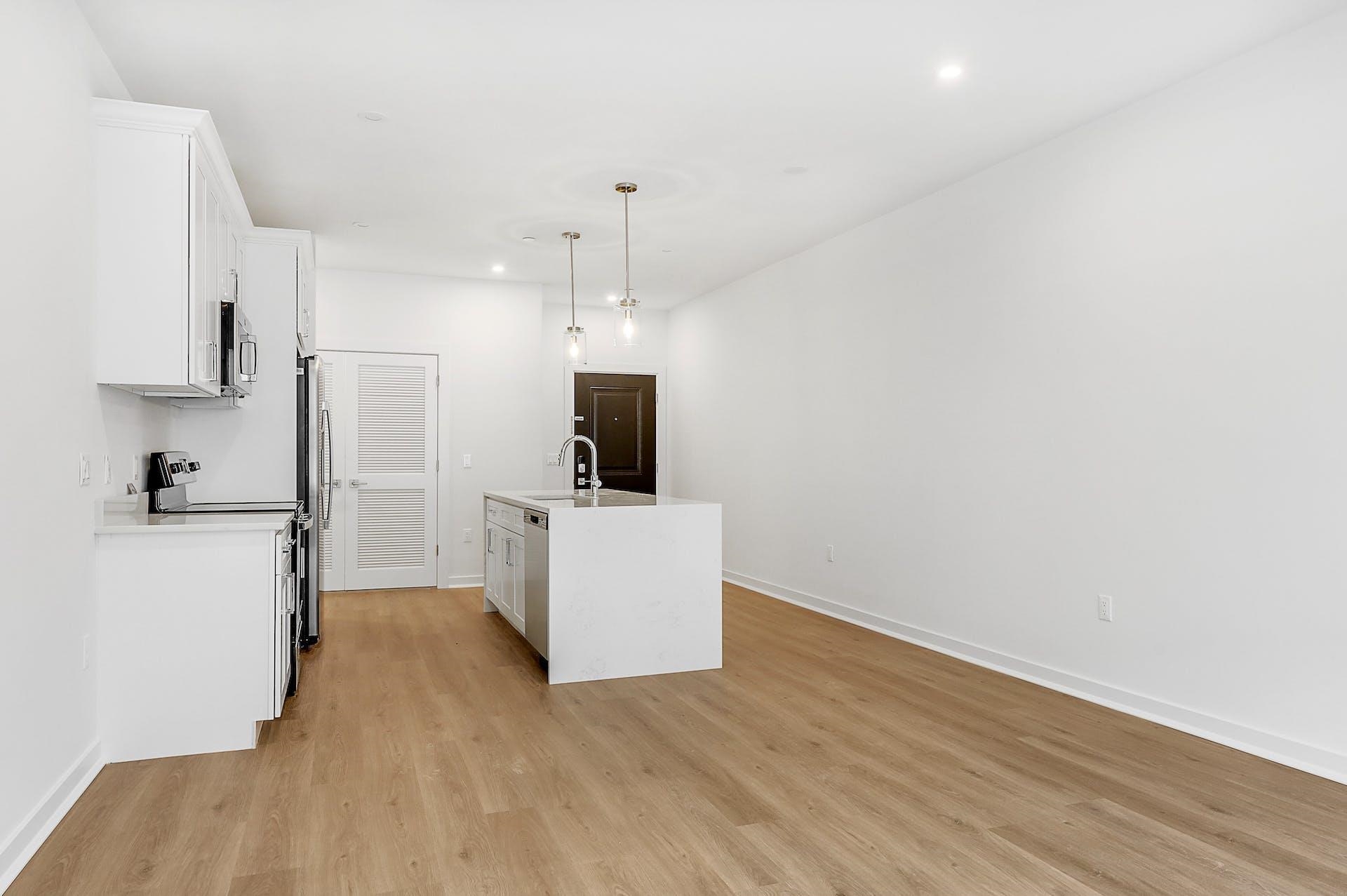74 Clarendon Place, Unit 202 Hackensack, NJ 07601 - Photo 7 of 33 a view of kitchen with microwave and refrigerator
