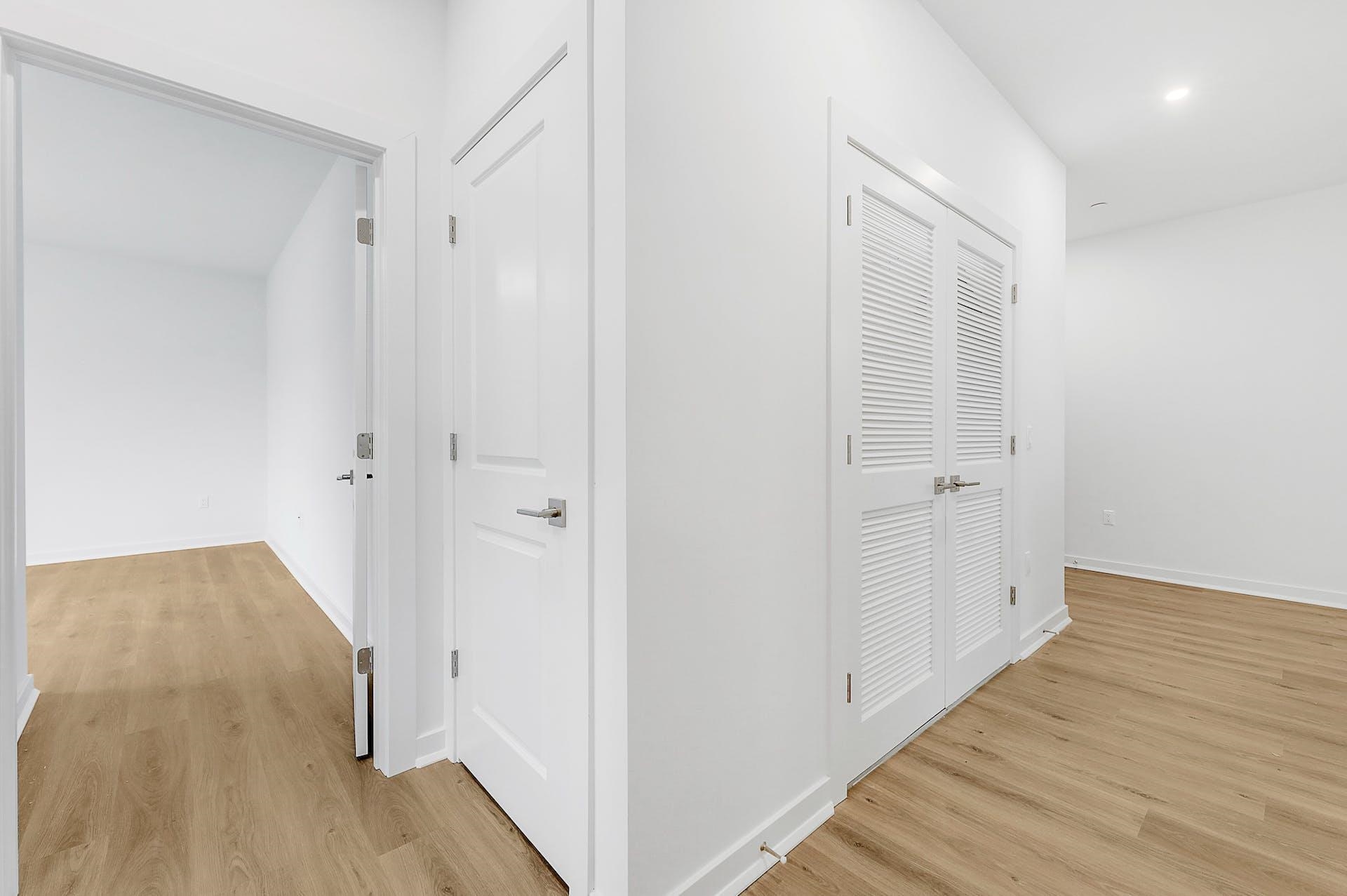 74 Clarendon Place, Unit 202 Hackensack, NJ 07601 - Photo 9 of 33 a view of a hallway with wooden floor