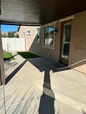 a view of a backyard of a house