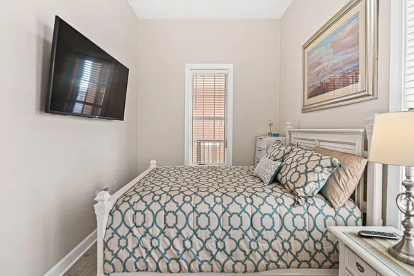 a view of a swimming pool with a lawn chairs