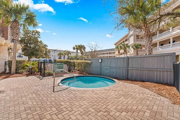 a view of a building with a swimming pool