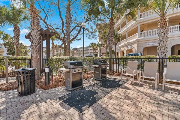 a view of a hallway with wooden shelves