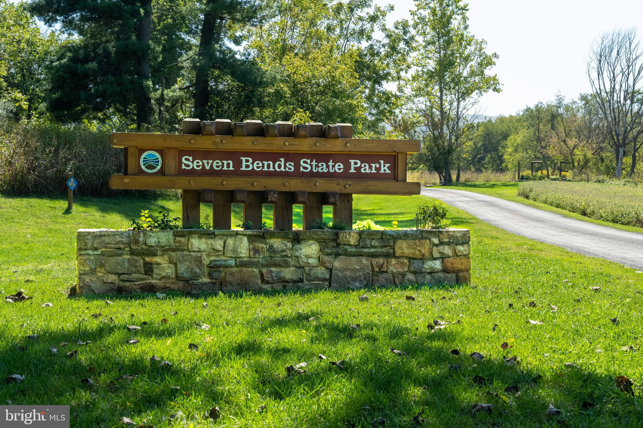 Stage Coach Road Woodstock, VA 22664 - Photo 23 of 25 a view of a park that has tree in the grass