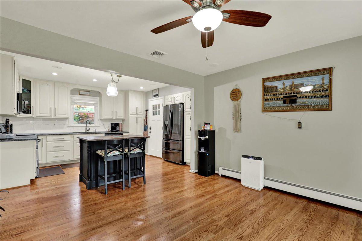 40 Hunters Run Road Honey Brook, PA 19344 - Photo 16 of 47 Open layout and newly finished wood floors.