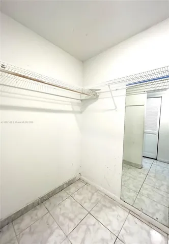 a view of a room with an empty space