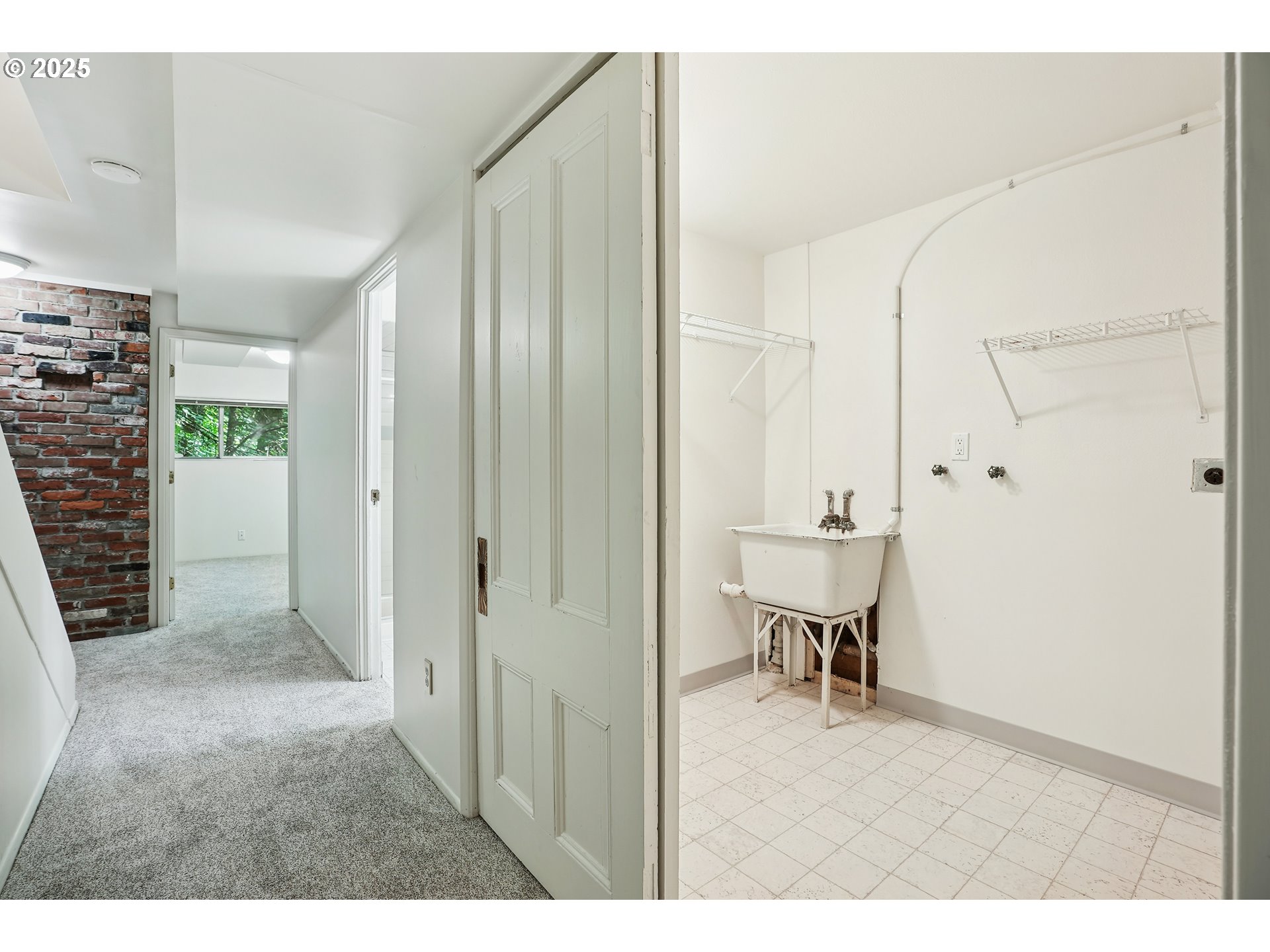 3270 Southwest Fairmount Boulevard Portland, OR 97239 - Photo 33 of 48 a view of a hallway with dining area and glass door