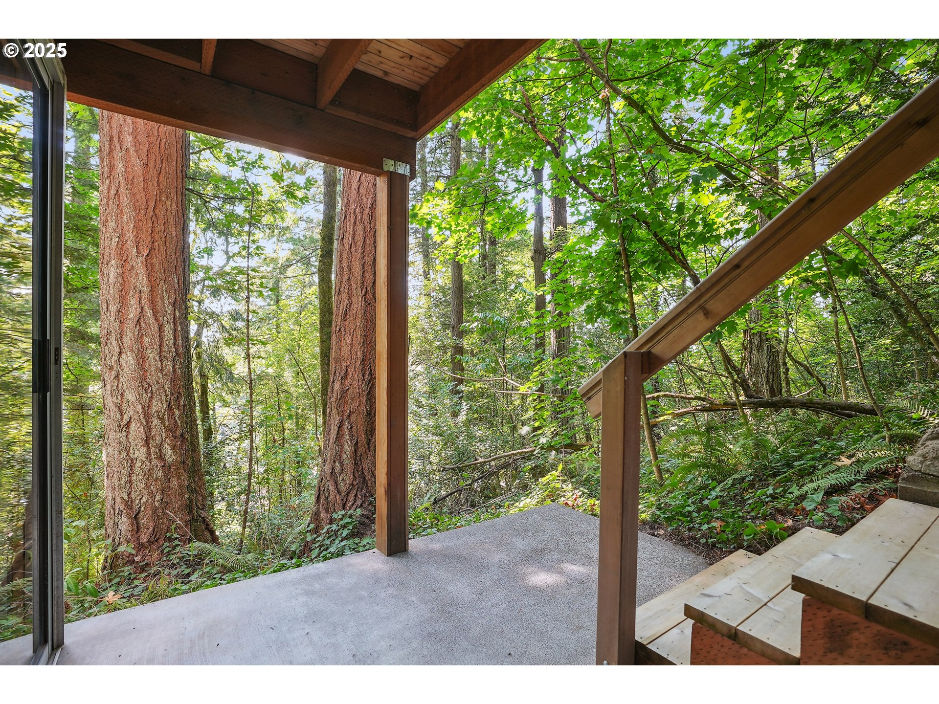 3270 Southwest Fairmount Boulevard Portland, OR 97239 - Photo 48 of 48 a view of a backyard from a balcony