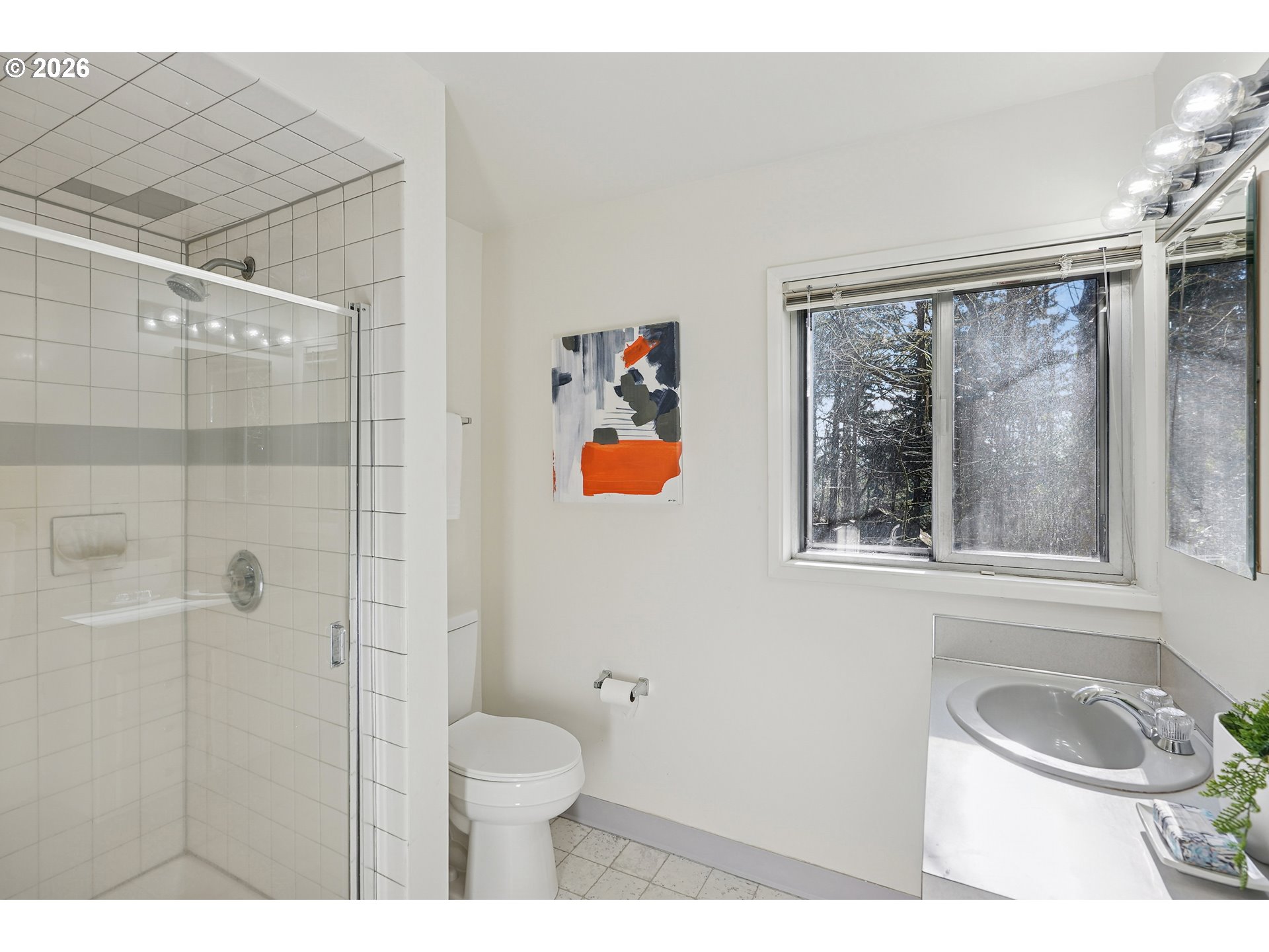 3270 Southwest Fairmount Boulevard Portland, OR 97239 - Photo 44 of 48 a bathroom with a sink toilet and shower