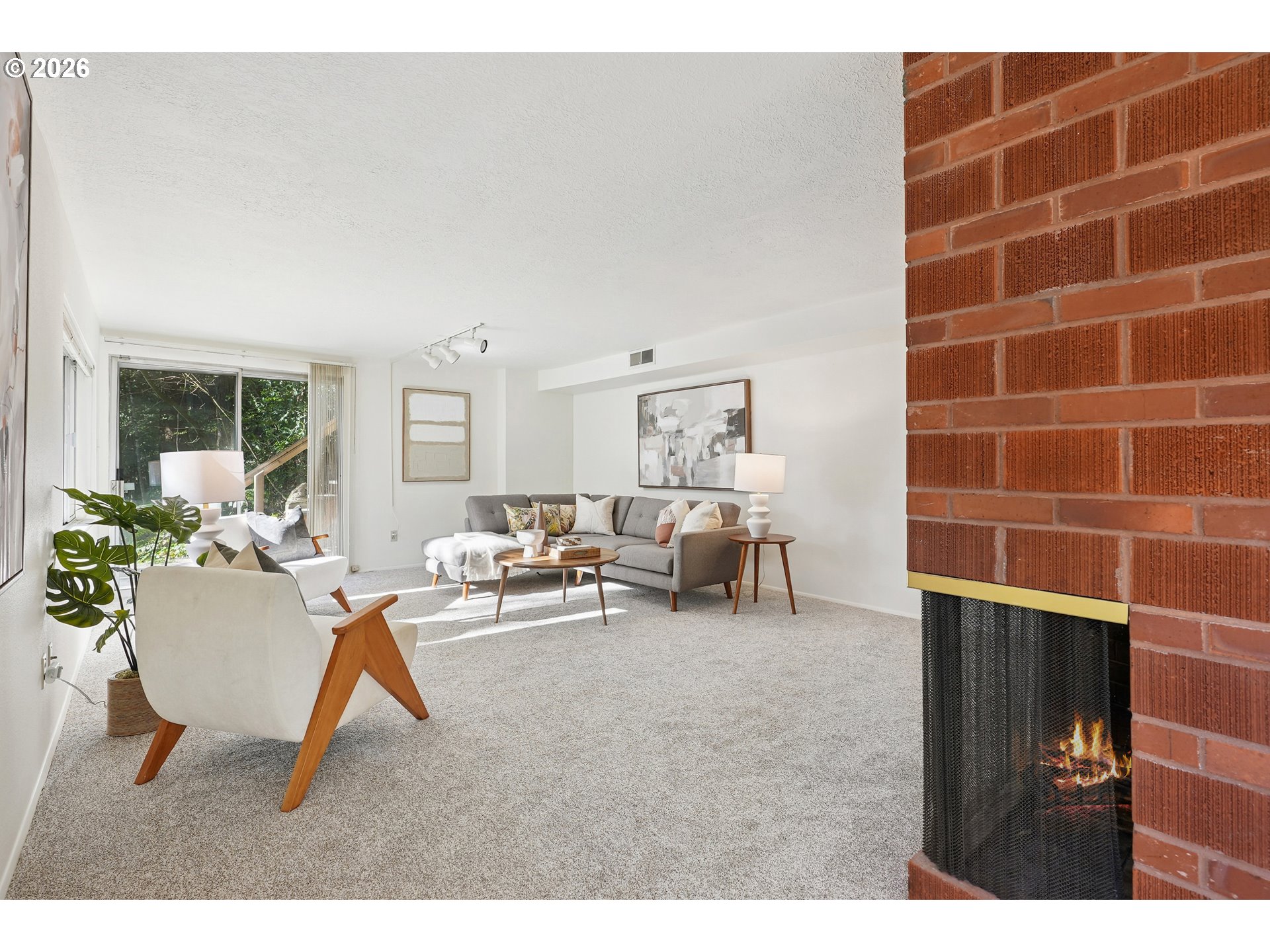 3270 Southwest Fairmount Boulevard Portland, OR 97239 - Photo 45 of 48 a living room with furniture a rug and a window