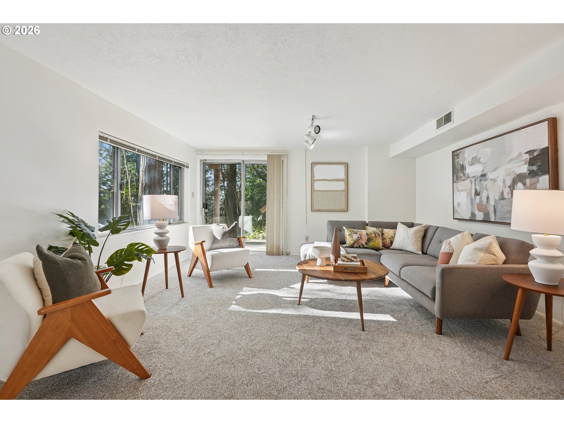 3270 Southwest Fairmount Boulevard Portland, OR 97239 - Photo 46 of 48 a living room with furniture and a large window