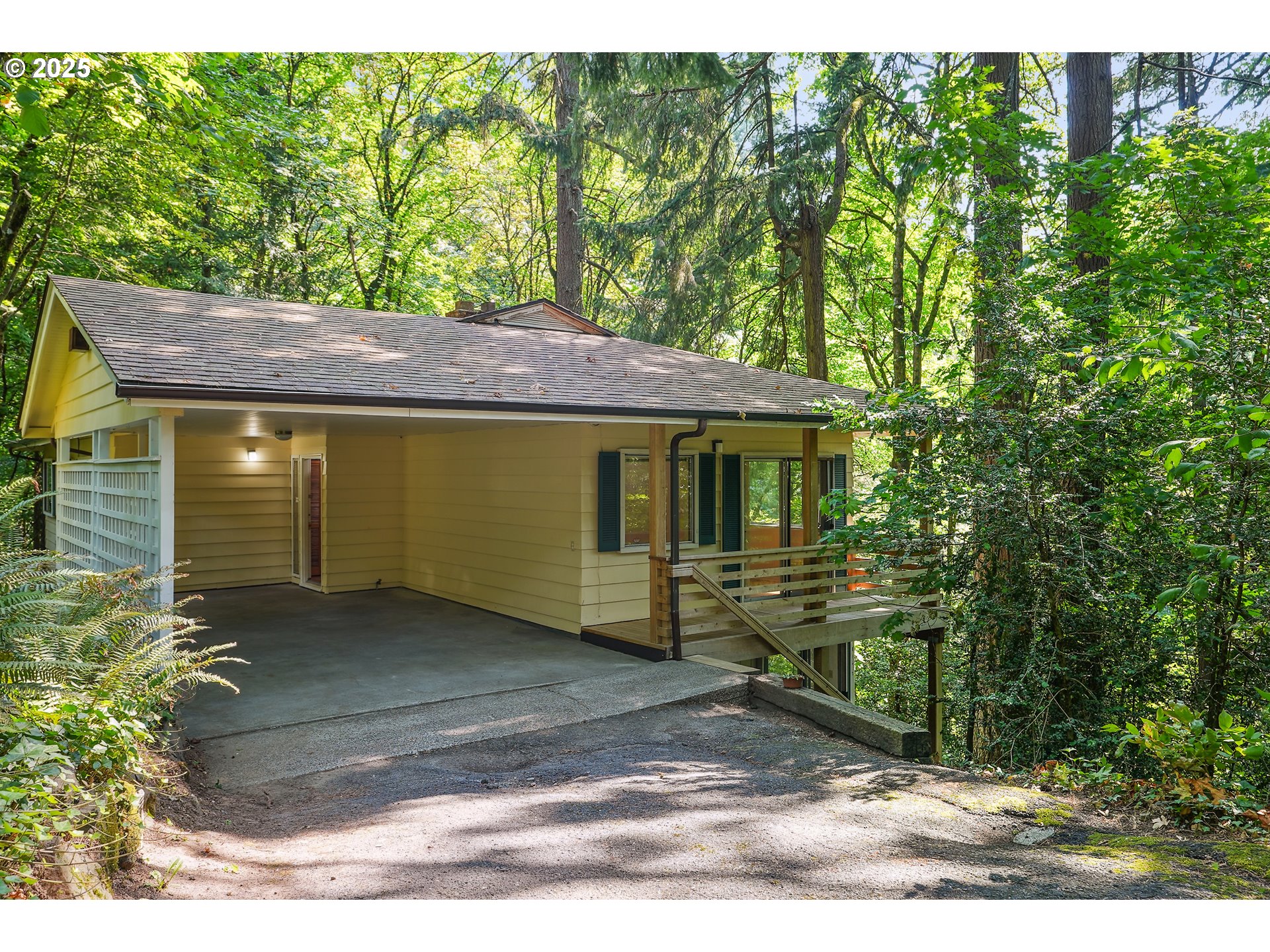 3270 Southwest Fairmount Boulevard Portland, OR 97239 - Photo 6 of 48 a front view of a house with a garden