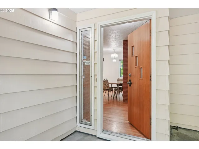 a view of a bedroom from a hallway
