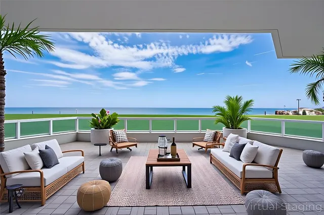 a building view with seating space and garden view