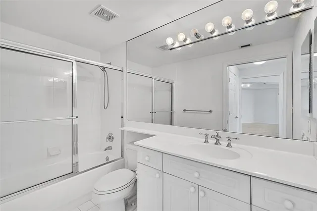 a hallway with a flat screen tv