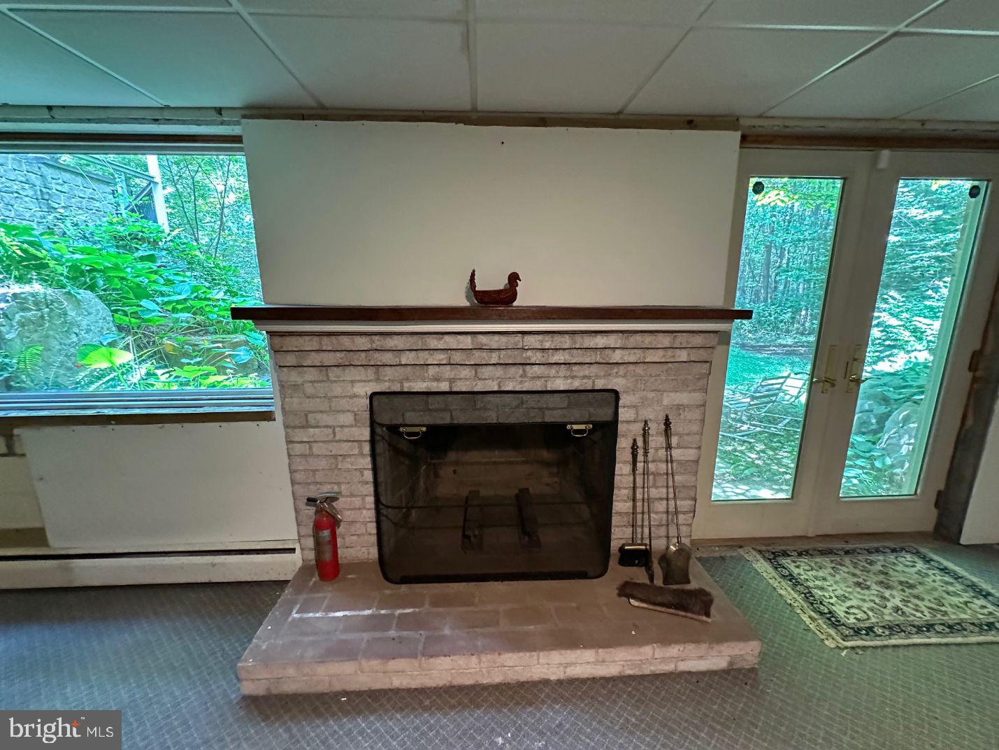 7244 Mink Hollow Road Highland, MD 20777 - Photo 55 of 120 Wood Burning Fireplace in Basement Wal-out Bed Rm.
