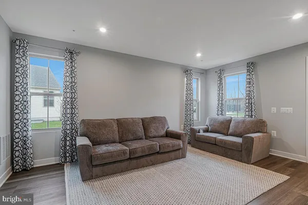 a living room with furniture and a couch