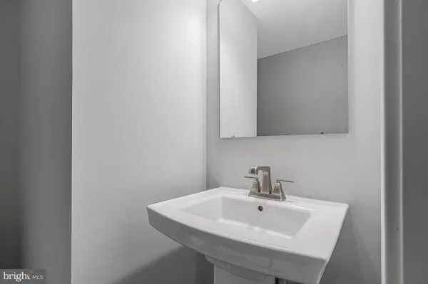 a white sink sitting next to a white sink