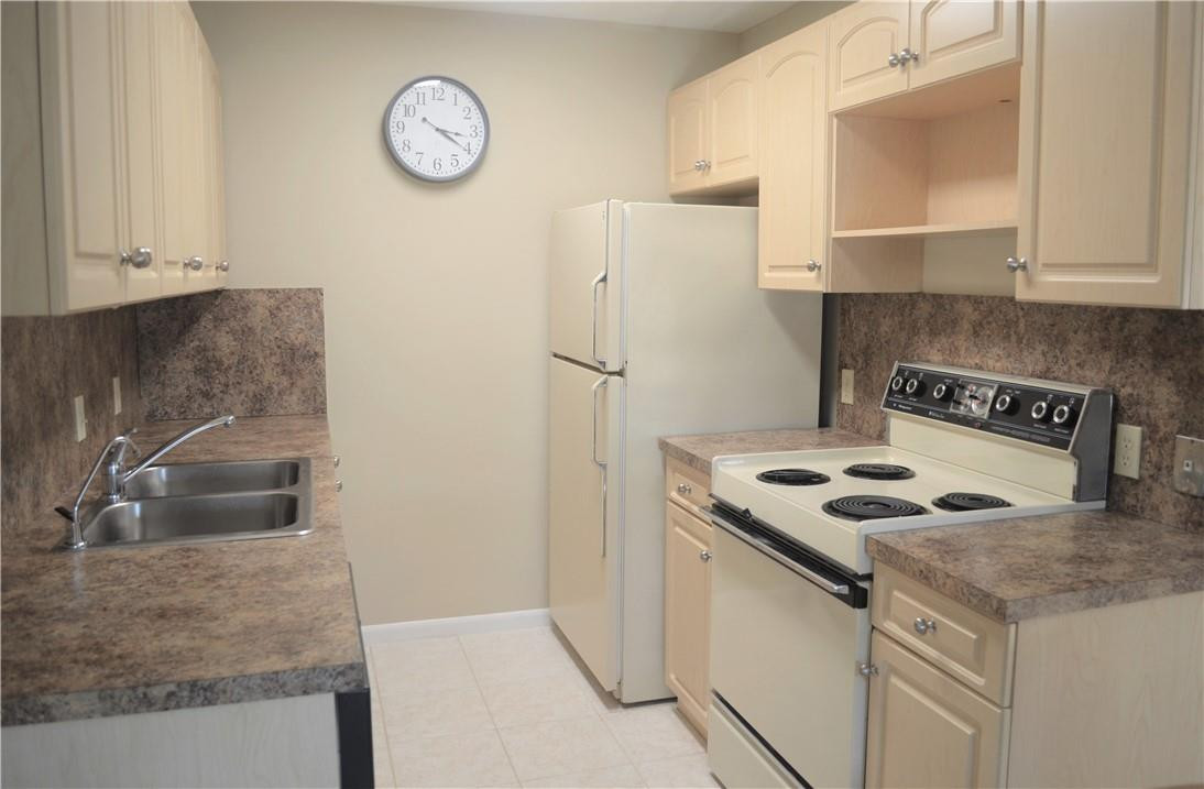 2006 Guildford East, Unit 2006 Boca Raton, FL 33434 - Photo 9 of 26 Kitchen