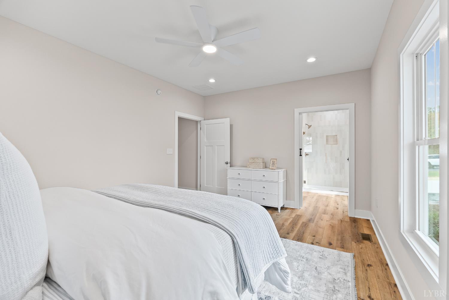 2441 River Road Madison Heights, VA 24572 - Photo 16 of 45 a bedroom with a bed and a large window