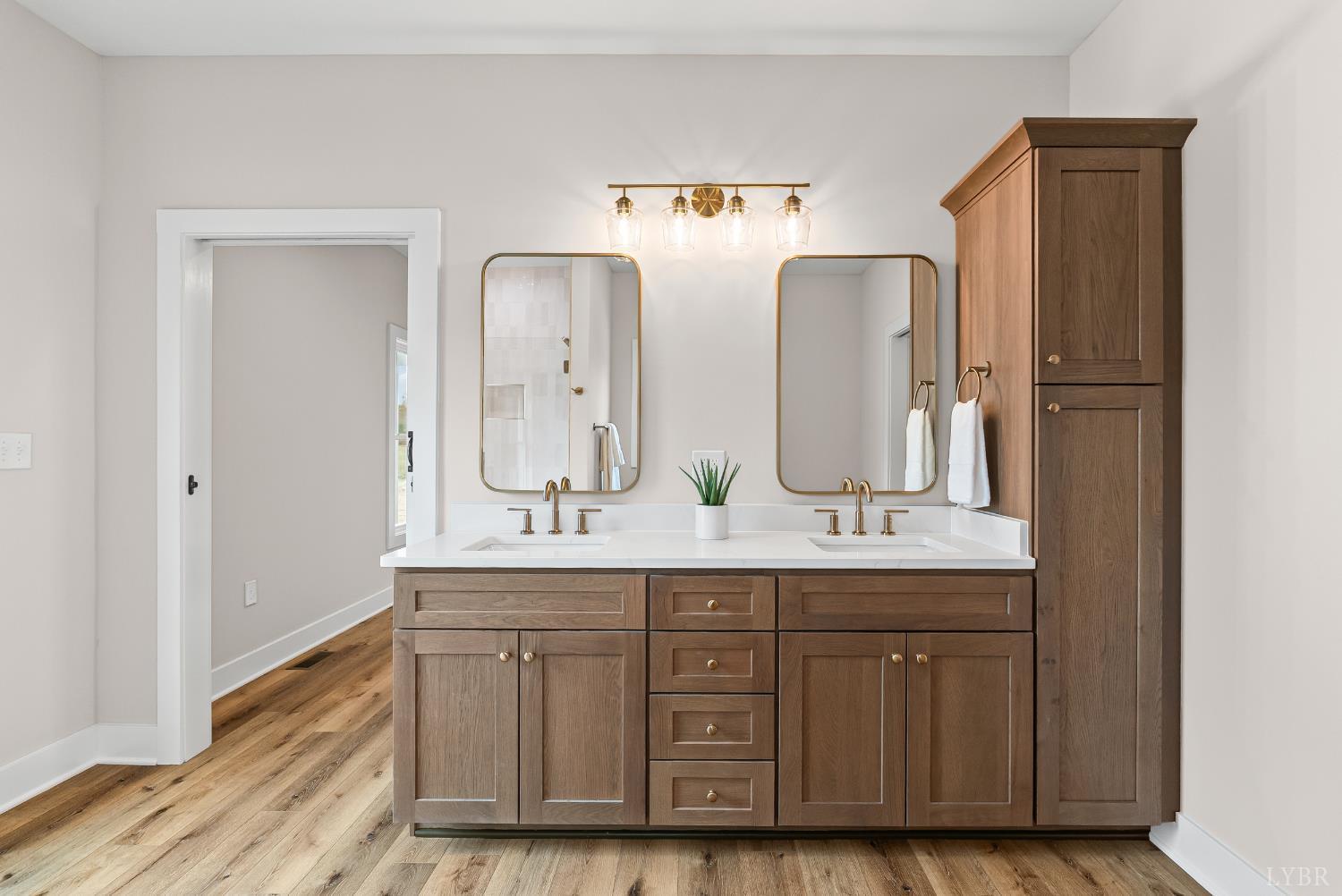 2441 River Road Madison Heights, VA 24572 - Photo 18 of 45 a bathroom with double vanity sinks and a mirror