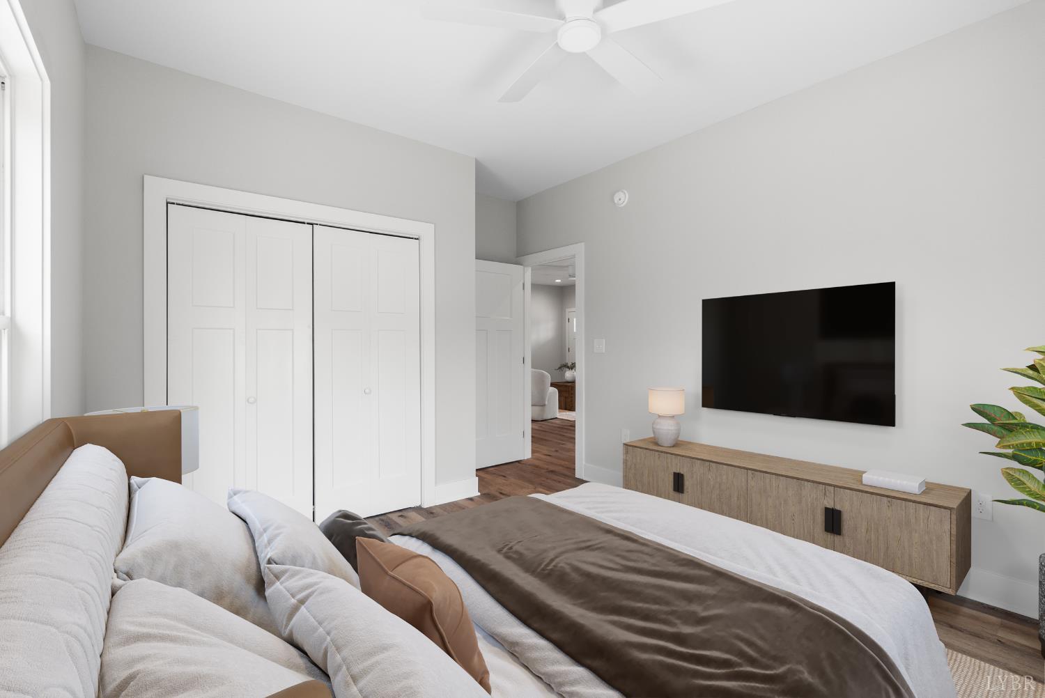 2441 River Road Madison Heights, VA 24572 - Photo 24 of 45 a bedroom with a bed and a flat screen tv