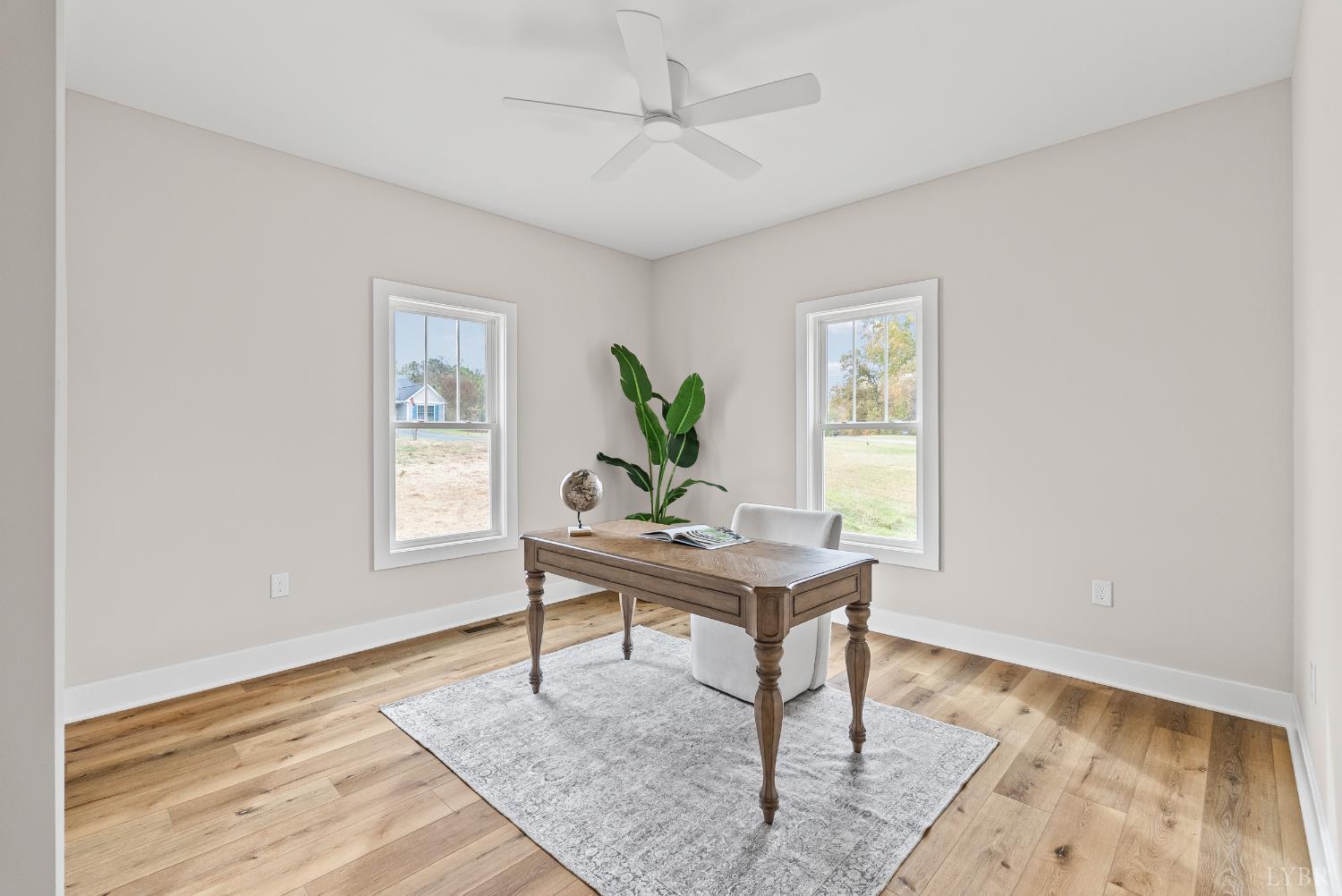 2441 River Road Madison Heights, VA 24572 - Photo 28 of 45 a living room with a table and a window