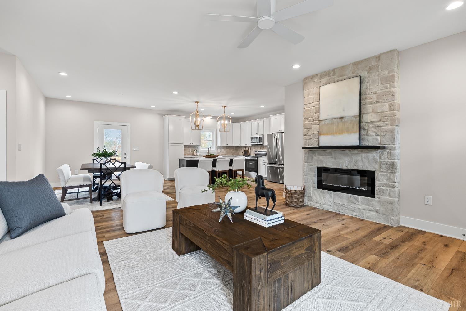 2441 River Road Madison Heights, VA 24572 - Photo 4 of 45 a living room with furniture and a fireplace