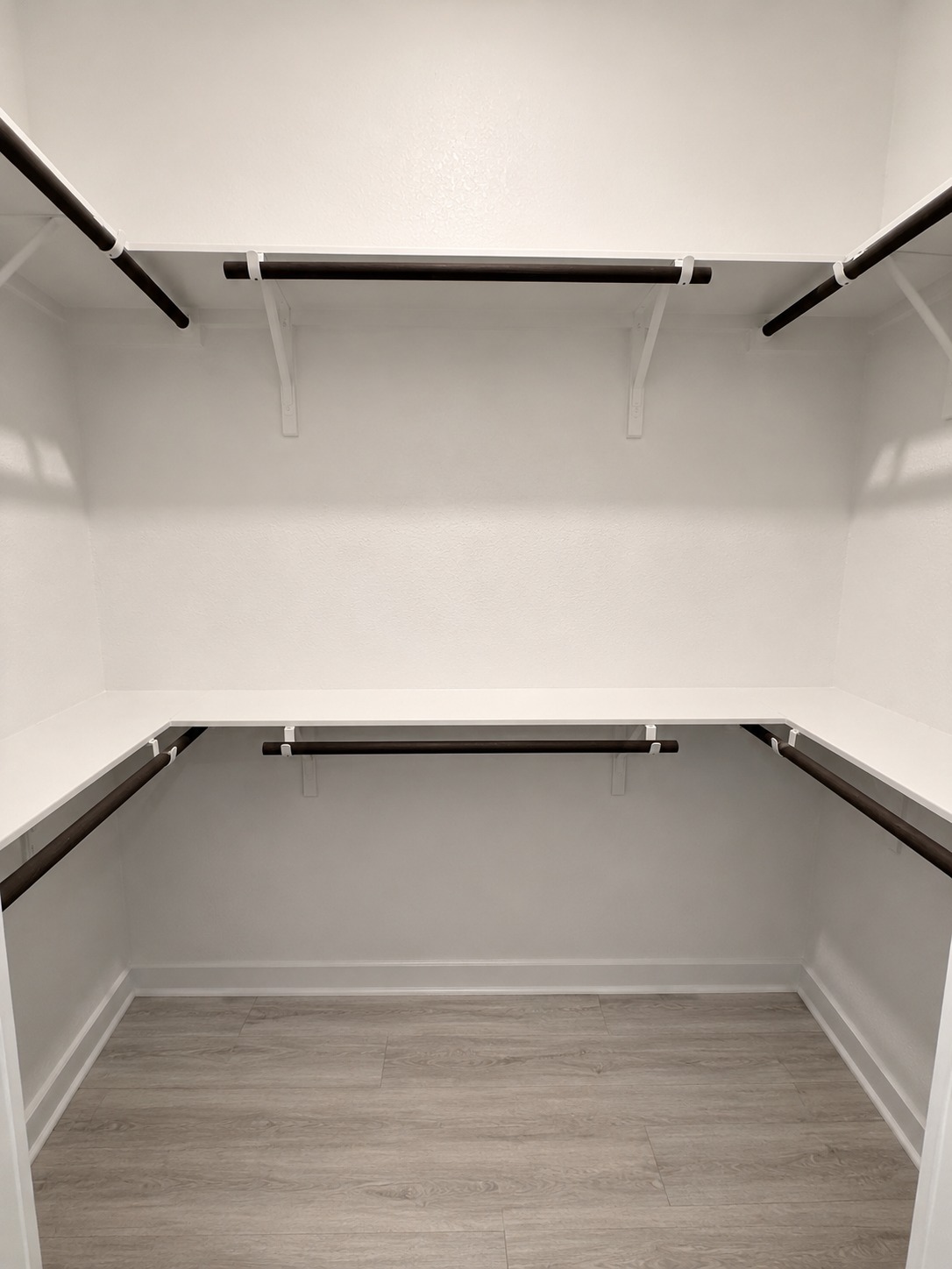 1213 Bryson Rdg Trail Leander, TX 78641 - Photo 12 of 16 Ample shelving and hanging space defines this well-organized, spacious closet.