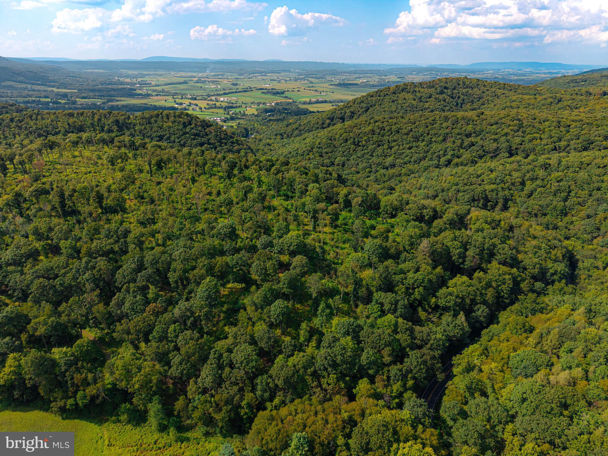 a view of an outdoor space and a lake view