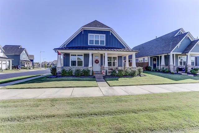 a view of a house with a swimming pool