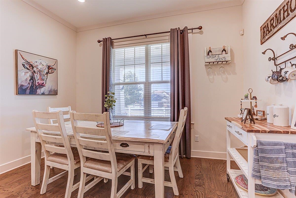 5566 Gerber Road Arlington, TN 38002 - Photo 14 of 33 a view of a dining room with furniture window and wooden floor