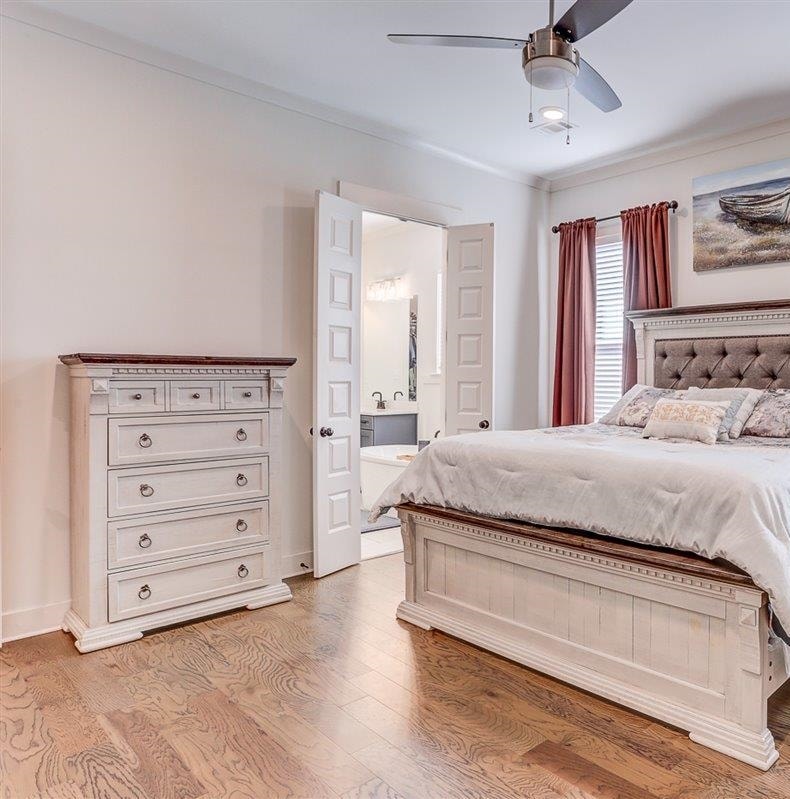 5566 Gerber Road Arlington, TN 38002 - Photo 22 of 33 a spacious bedroom with a bed and a dresser