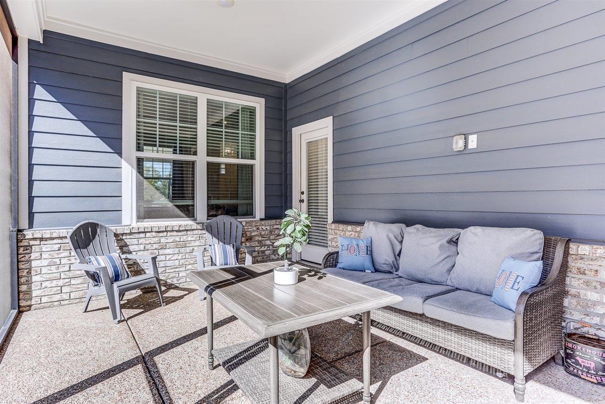 5566 Gerber Road Arlington, TN 38002 - Photo 29 of 33 a view of a patio with a table and chairs