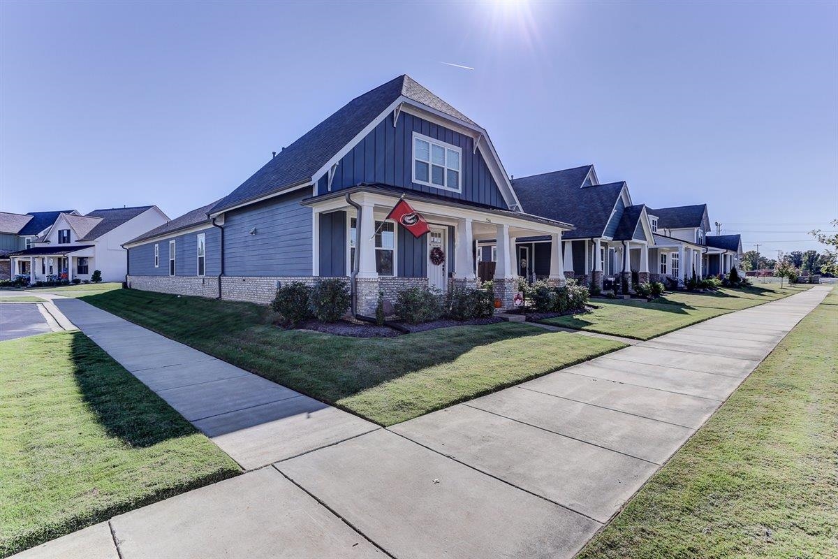 5566 Gerber Road Arlington, TN 38002 - Photo 3 of 33 a front view of a house with yard