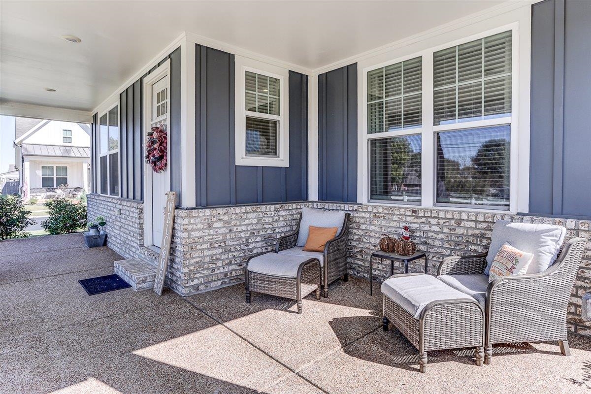 5566 Gerber Road Arlington, TN 38002 - Photo 6 of 33 a outdoor living space with furniture and a potted plant
