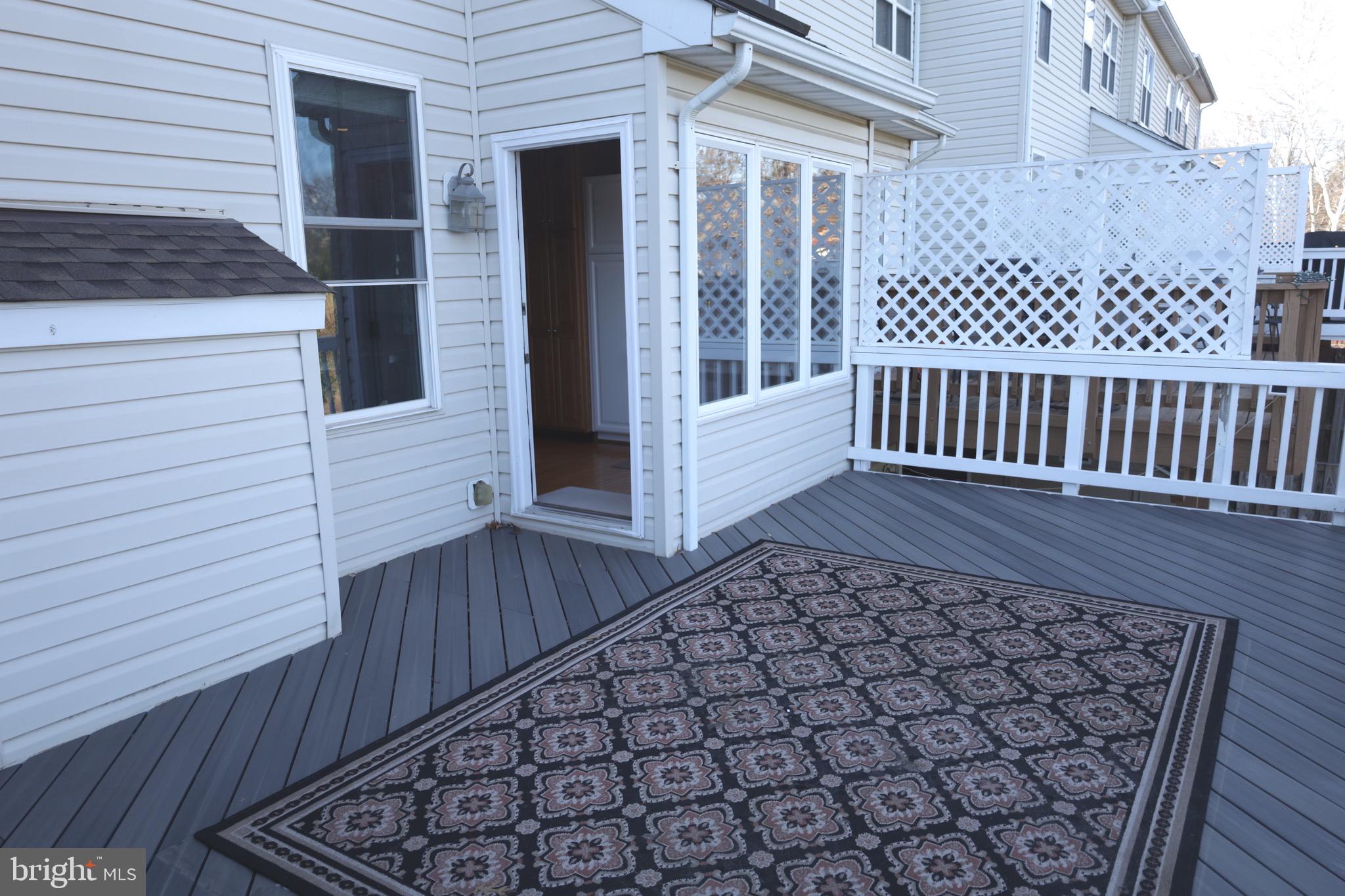 21543 Trowbridge Square Ashburn, VA 20147 - Photo 13 of 60 a view of a wooden deck
