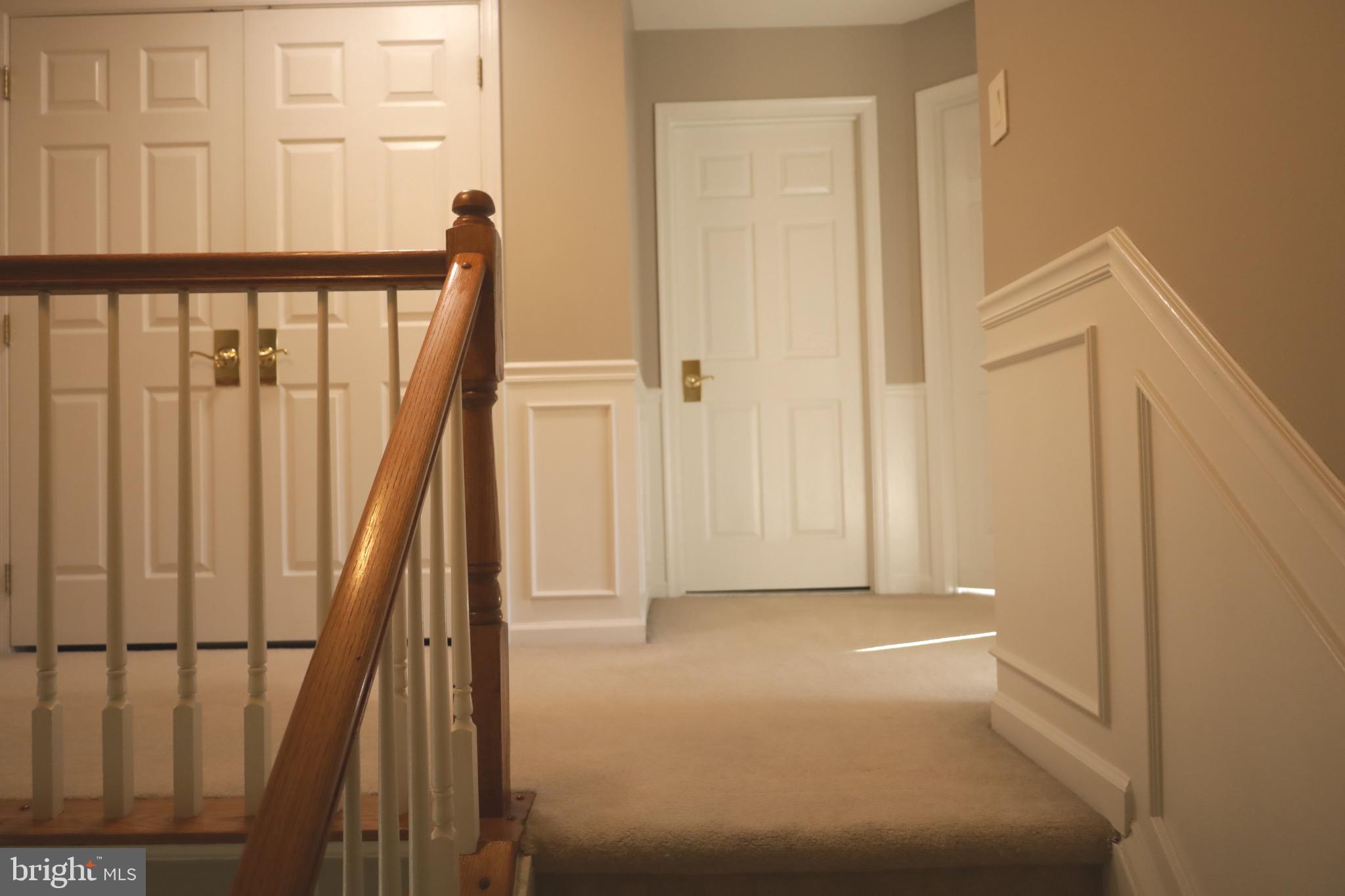 21543 Trowbridge Square Ashburn, VA 20147 - Photo 17 of 60 a view of a porch with wooden floor