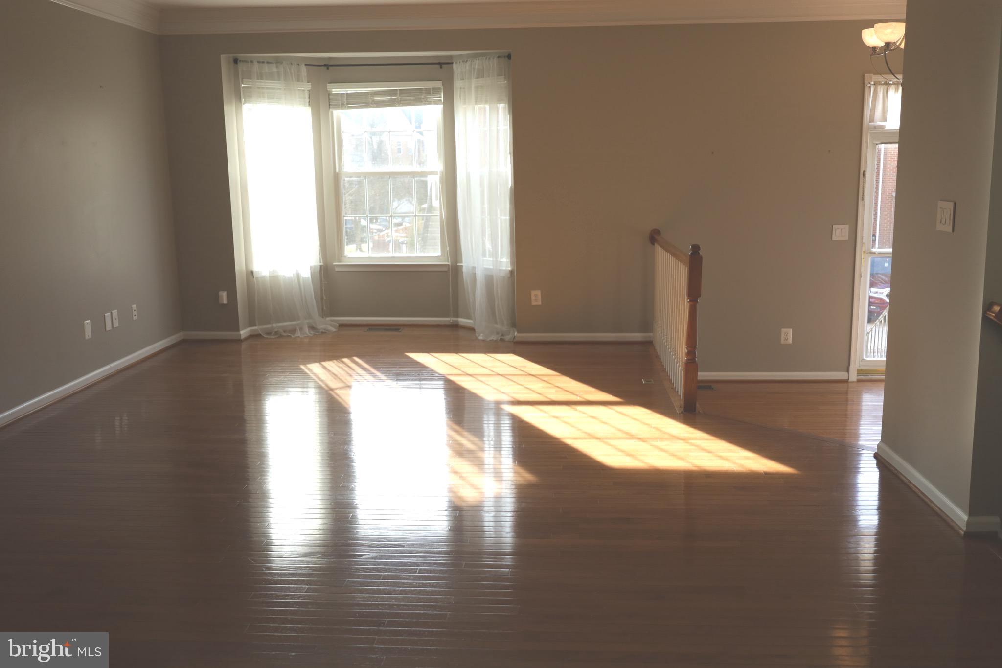 21543 Trowbridge Square Ashburn, VA 20147 - Photo 4 of 60 a view of an empty room and window