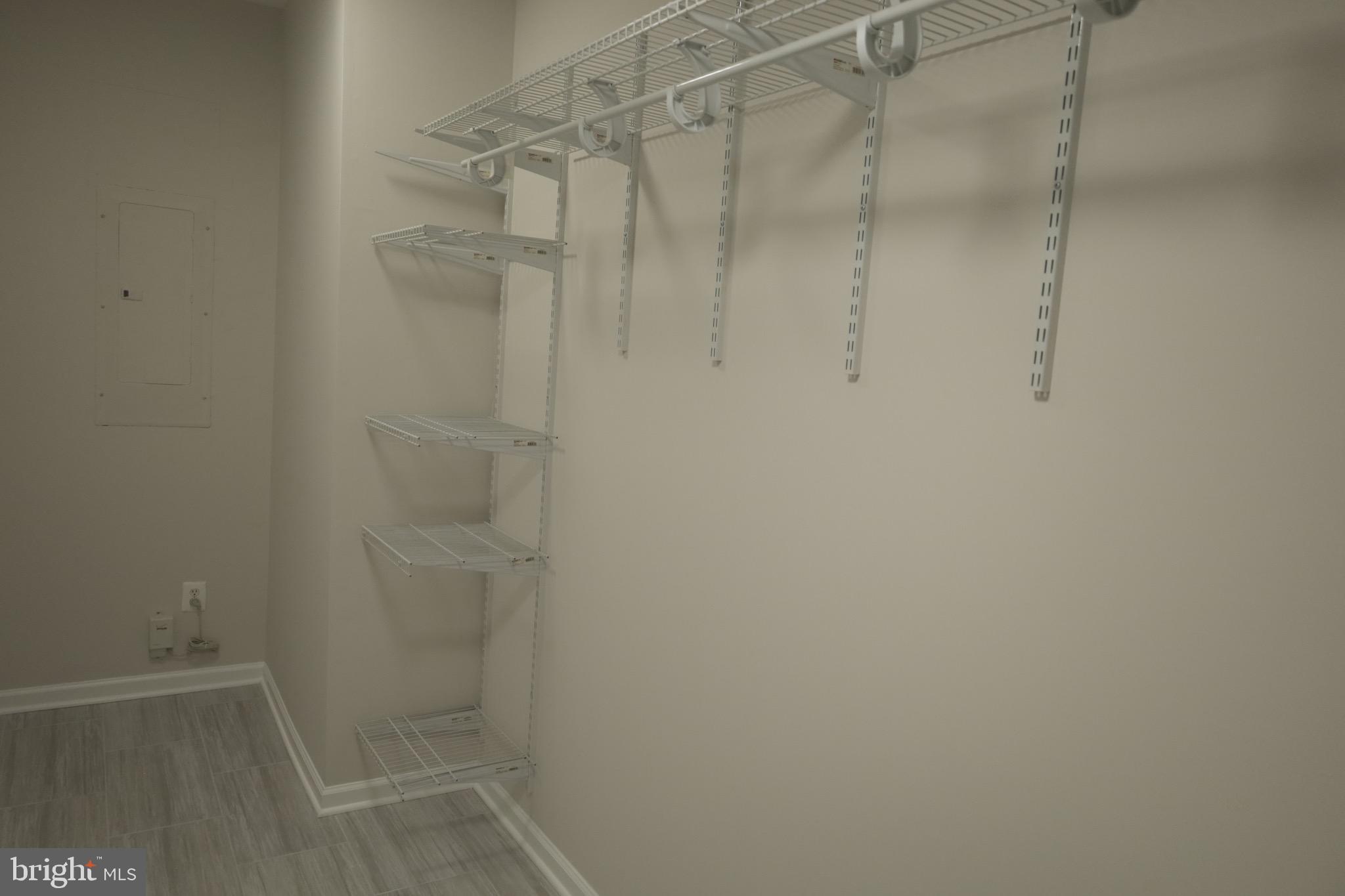 21543 Trowbridge Square Ashburn, VA 20147 - Photo 42 of 60 a bathroom with a glass door shower