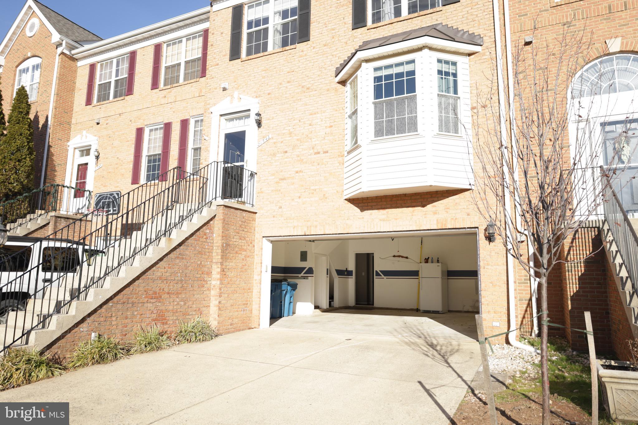 21543 Trowbridge Square Ashburn, VA 20147 - Photo 54 of 60 a view of a building with many windows