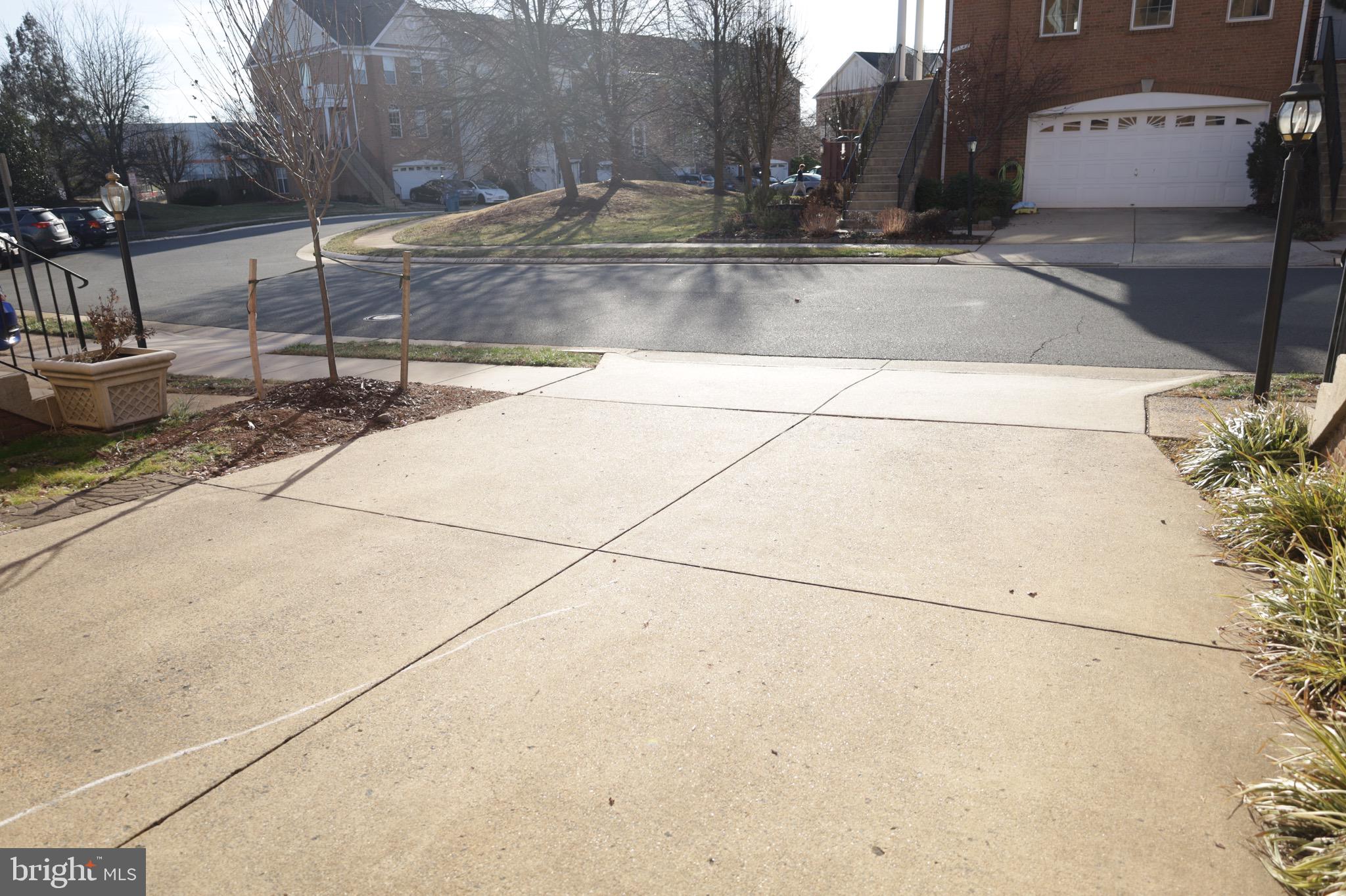 21543 Trowbridge Square Ashburn, VA 20147 - Photo 57 of 60 a view of a street with houses
