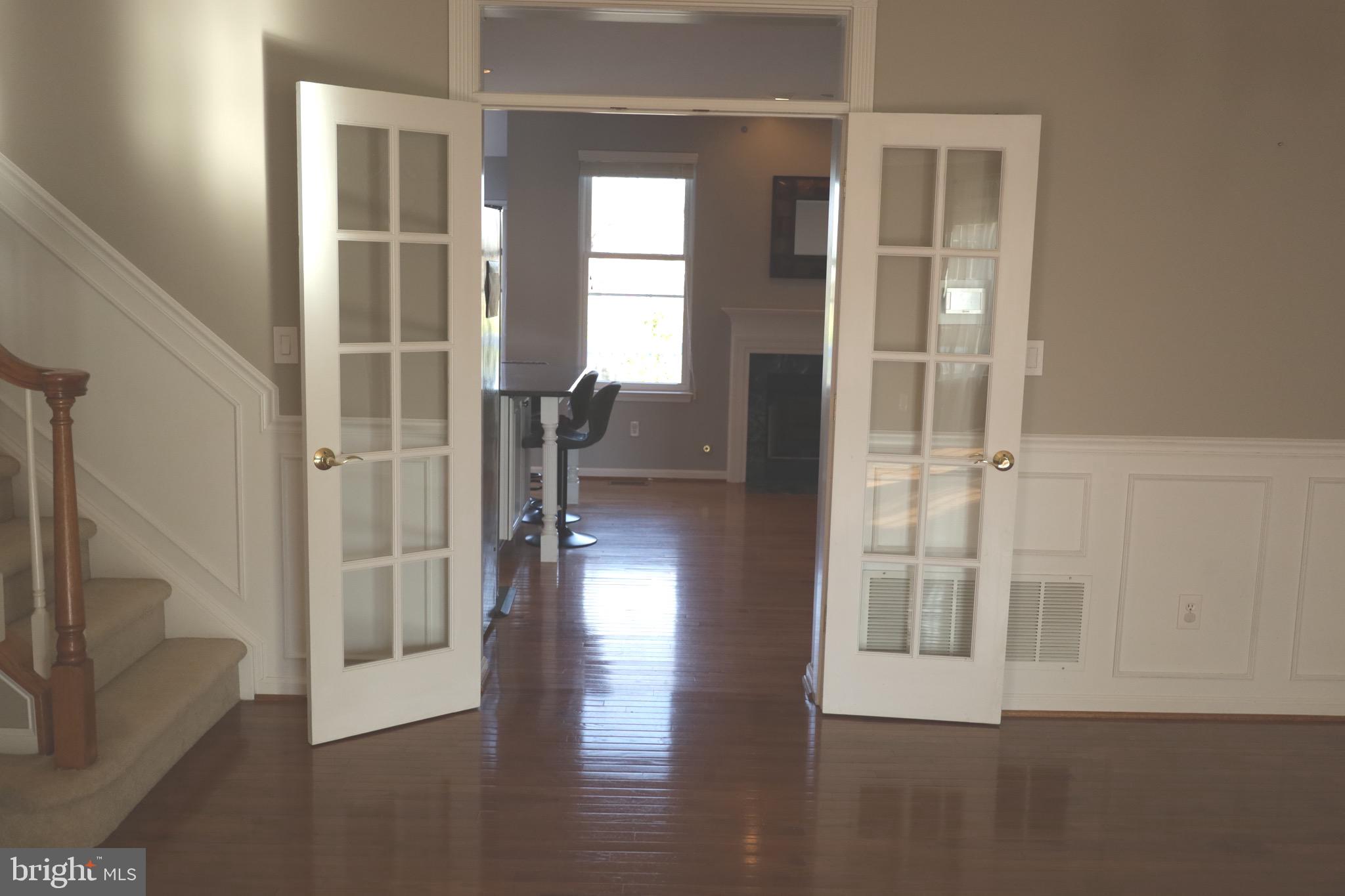 21543 Trowbridge Square Ashburn, VA 20147 - Photo 7 of 60 a view of entryway with livingroom
