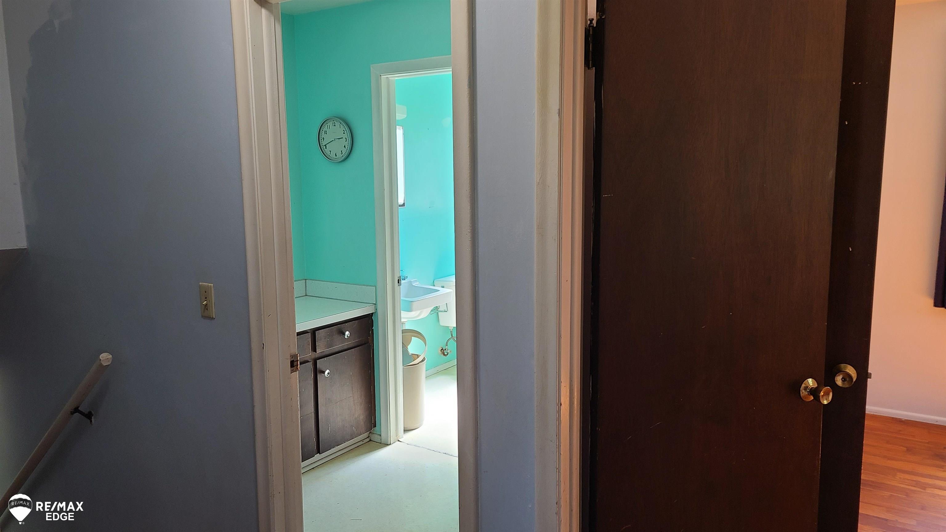 3324 Shannon Road Burton, MI 48529 - Photo 10 of 66 Bath entry from bedroom