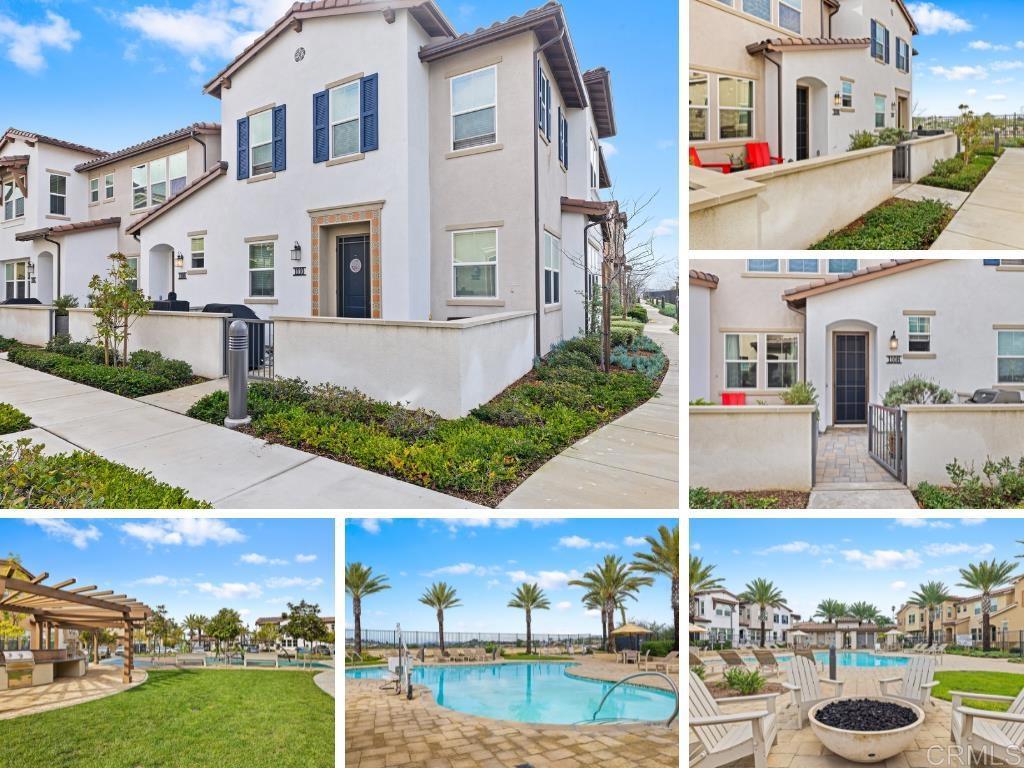 a view of a white house with a yard