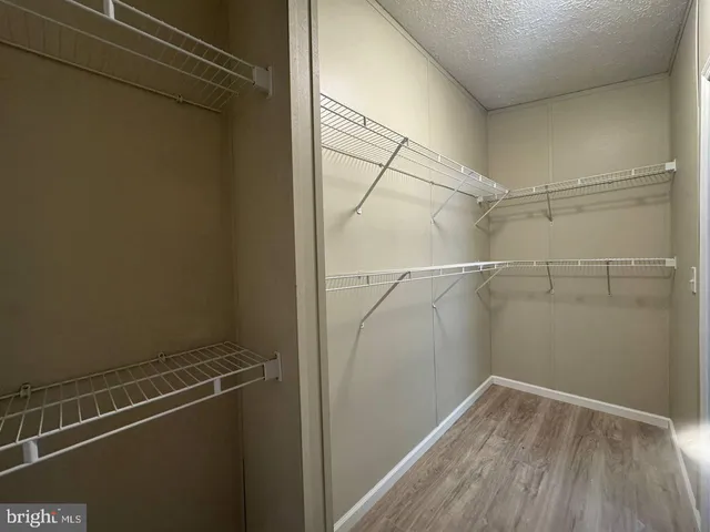 a view of a room with racks on the wall
