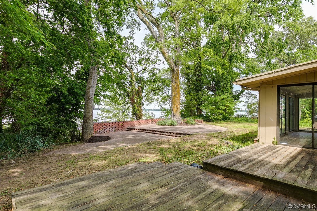 900 Jordan Point Road Hopewell, VA 23860 - Photo 30 of 41 a view of a house with backyard and sitting area